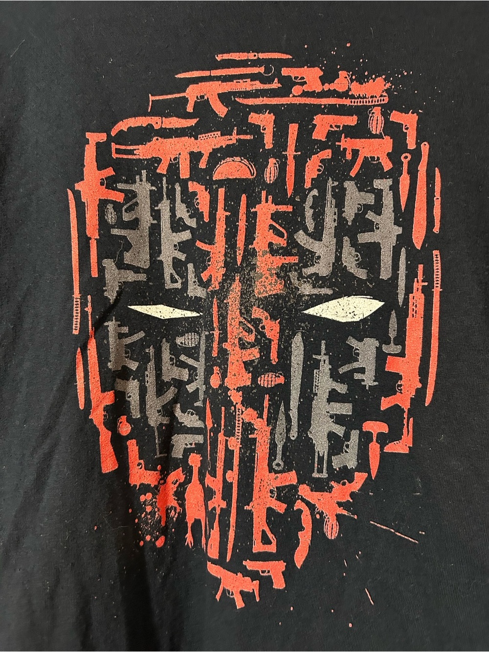 Men's Black Short Sleeve Graphic Tee with Red and Gray Mask Design